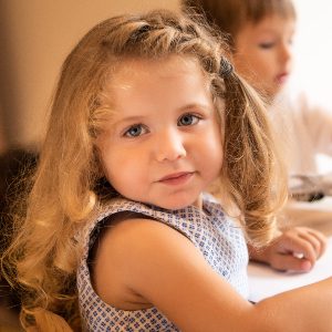 adorable-kid-drawing-in-kindergarten-and-looking-a-2021-04-29-23-17-22-utc.jpg